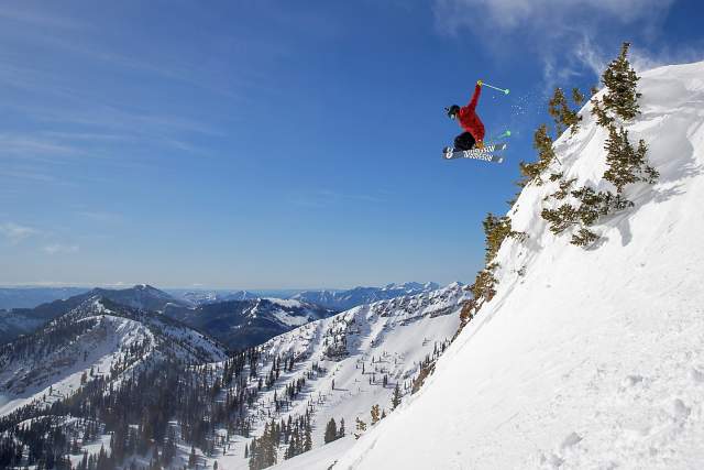 Skier Catching Air at Mineral Basin at Snowbird