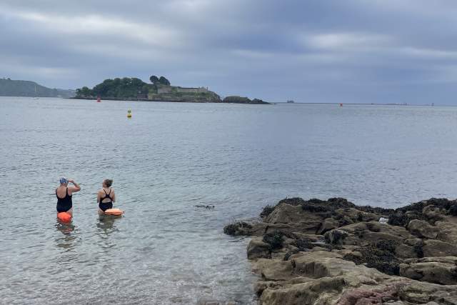Two female bathers in water at Firestone Bay, Plymouth