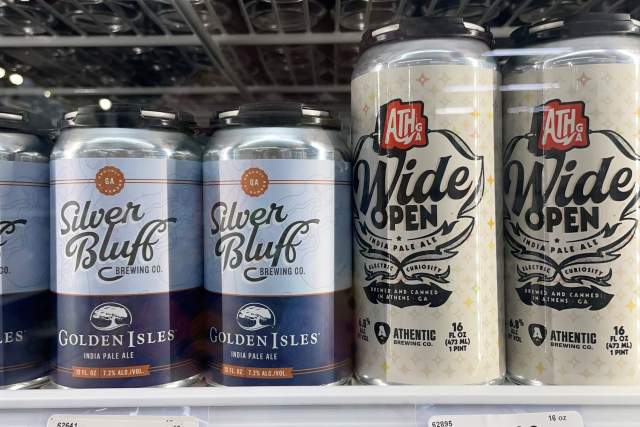 Golden Isles IPA and Wide Open IPA sit on a shelf ready for purchase
