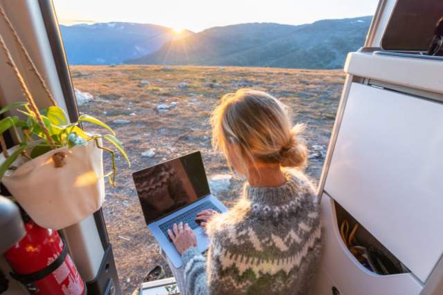 Solo Travel - Remote working woman in van