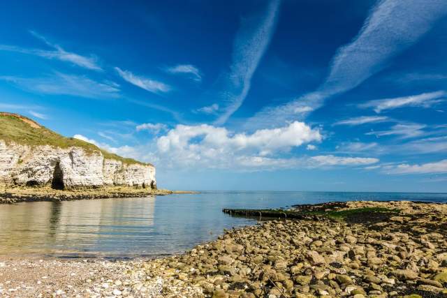 A rocky shoreline with cliffs near East Yorkshire.