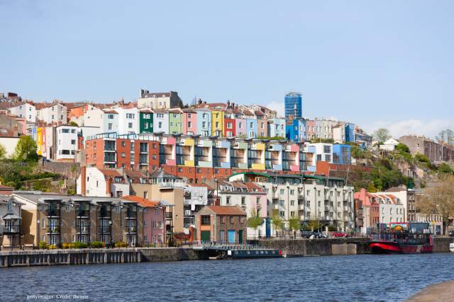Historic town houses overlooking Bristol's quay on a sunny day
