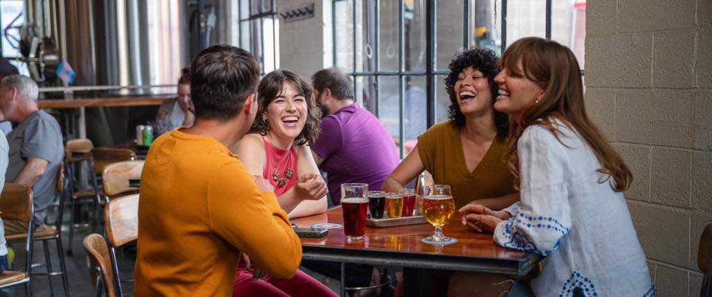 Image of a group of people at Fisher Brewing in SLC