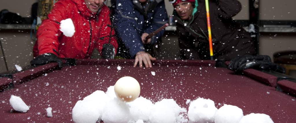 Playing Pool with Snowballs at The Thirsty Squirrel at Solitude