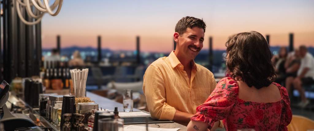Image of a couple at Van Ryder's rooftop bar