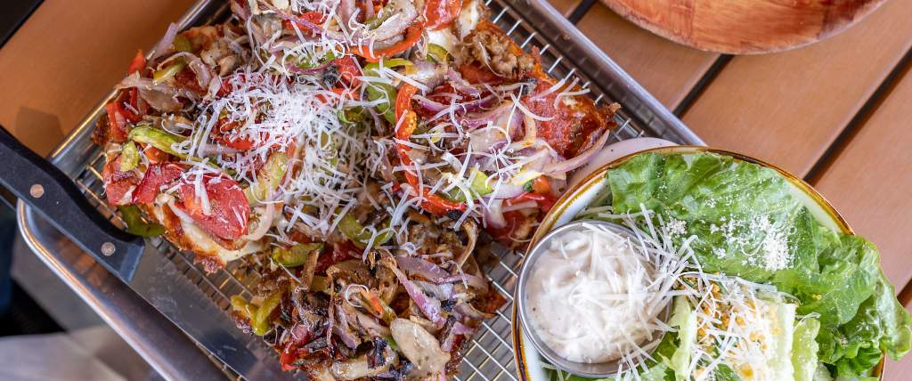 Pizza and salad at Bricks Corner