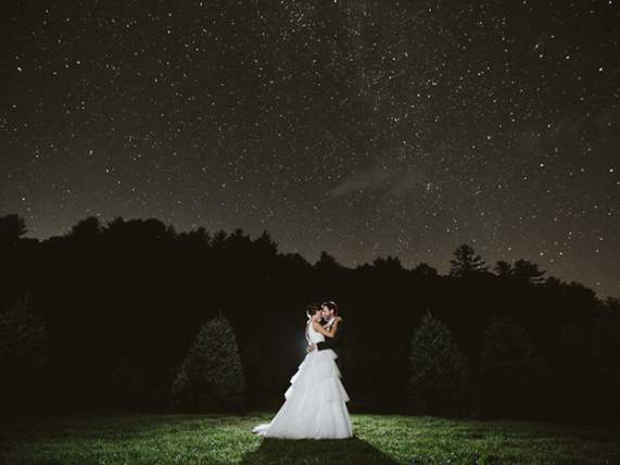 Bride and Groom at night with trees in the background