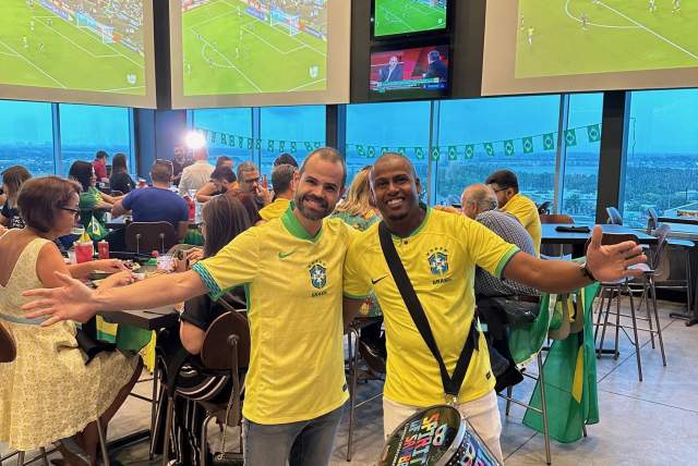 Celebrating at a soccer watch party with Brazilian shirts