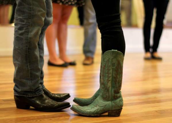 Man And Woman In Cowboy Boots At Glide Studios In Lafayette, LA