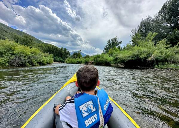 Boy on a tube on the Provo River