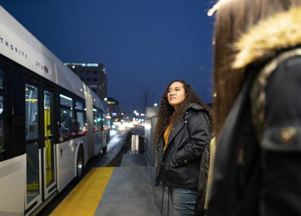 Girls Waiting at UVX Bus Stop