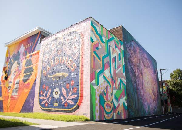 a few of the colorful murals at Mural Park in the Royal Square District