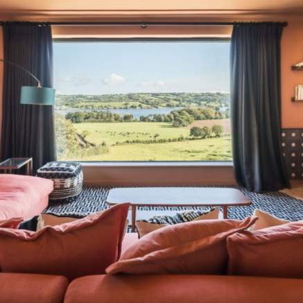 A view over countryside from a bedroom at Yeo Valley