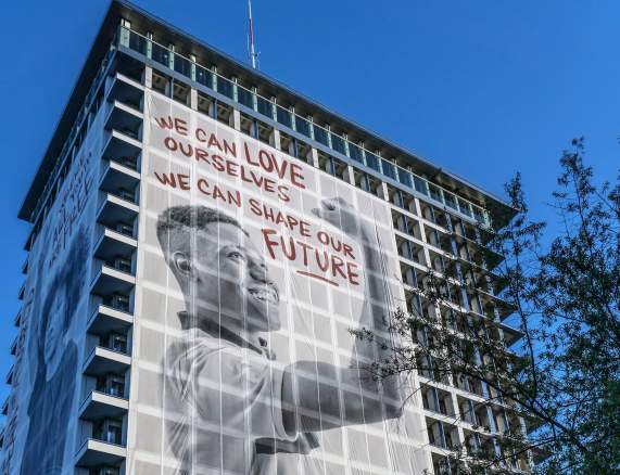 Richmond City Hall banner "We Can Love Ourselves. We can shape our Future"