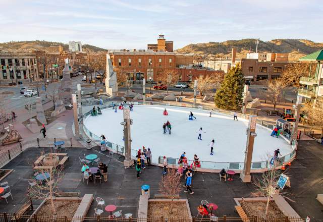 birds eye view of the main street square ice skating rink with skaters in rapid city, sd