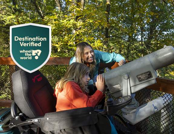 Mother and Daughter looking through telescope, with WTW verified badfe