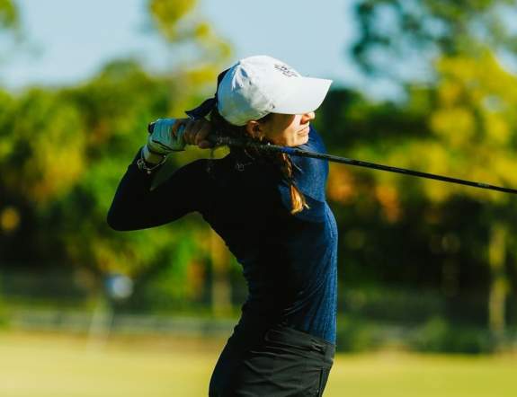 Carolin Alblas of Keiser (Fla.) after teeing off