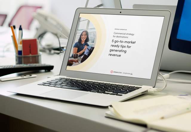 The Commercial strategy for destinations guide open up on a laptop.