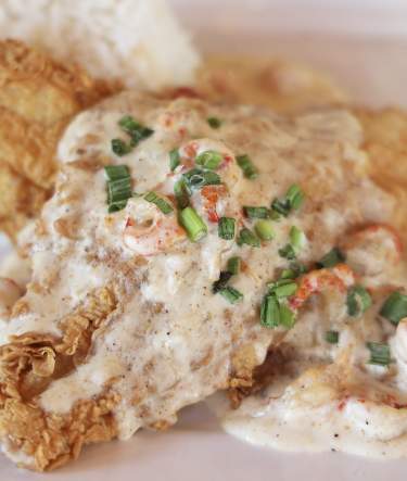 Fried Catfish with Crawfish Bisque at Floyd's Cajun Seafood and Steakhouse