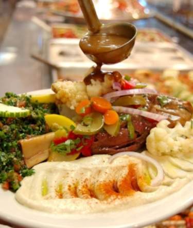 A very full buffet plate at Fadi's Mediterranean Grill