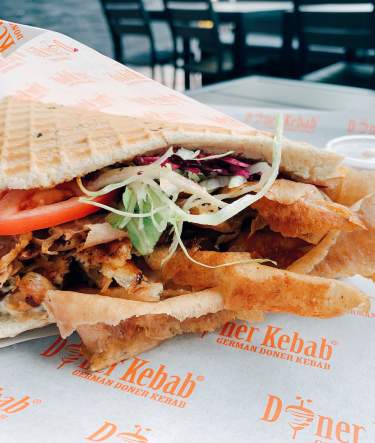 German Doner Kebab with chicken in signature doner bread