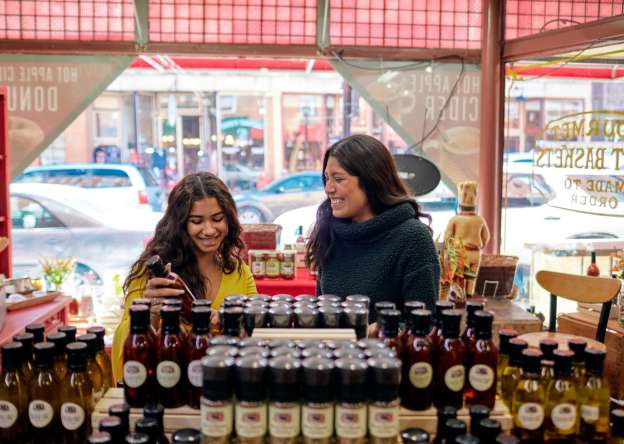 Two people shopping at Galena Canning Co.