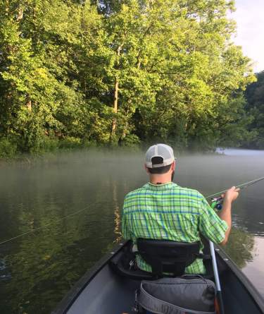Man fishing from his boat on the Clinch River