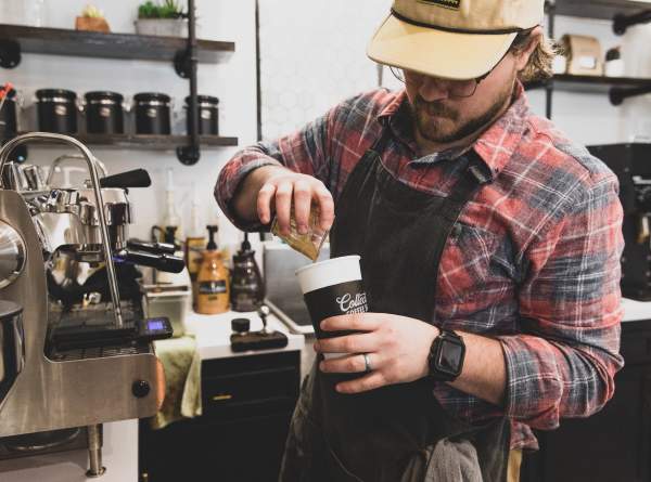 barista pouring coffee- workforce- hero