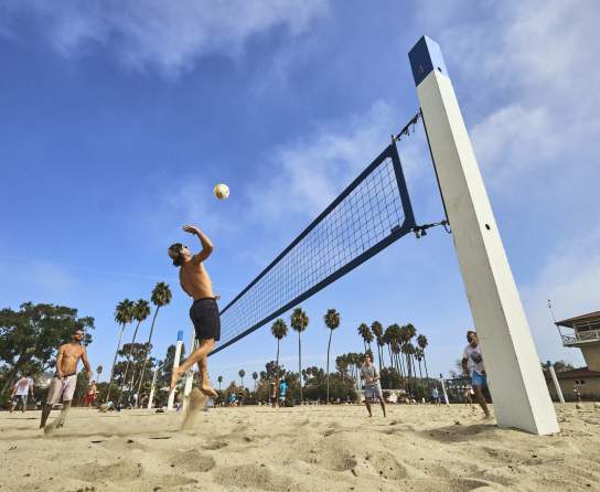 Vollyball players at Doheny State Beach in Orange county