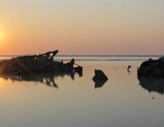 The wrecks of WWII Flying Catalinas at low tide in Roebuck Bay Broome
