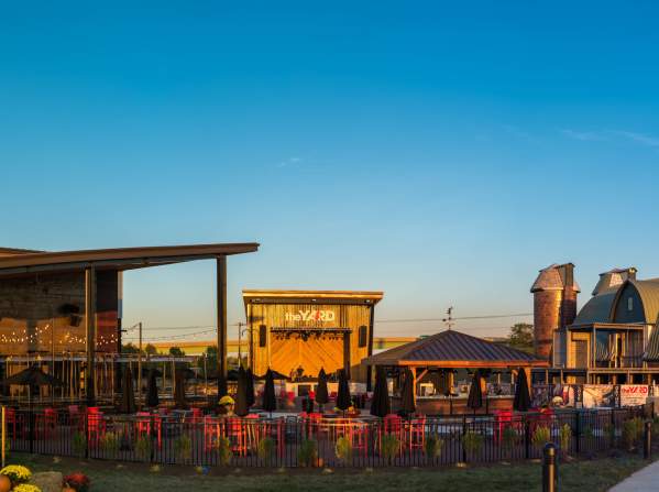 Panoramic of a property in Prince William, there is a pavilion, a stage, a barn as well as a patio