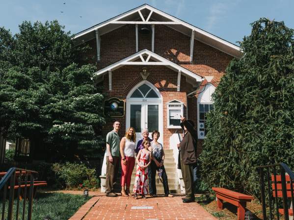 A family in front of Town Hall in Occoquan.