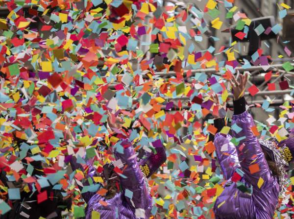 Air in Times Square filled with colored paper as organizers test New Year's Eve confetti