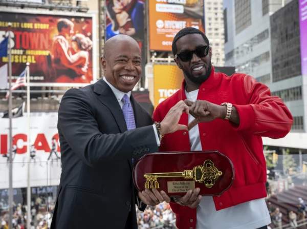 New York City mayor gives Sean 'Diddy' Combs a key to the city during a ceremony in Times Square
