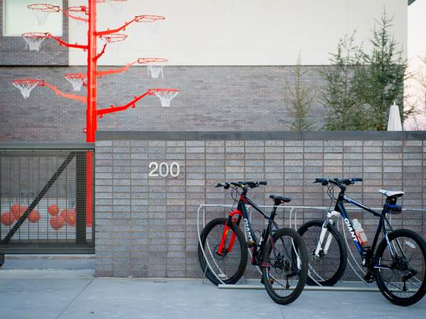 Bikes parked next to the "Orange Tree" art piece outside 21C Museum Hotel in Bentonville Arkansas