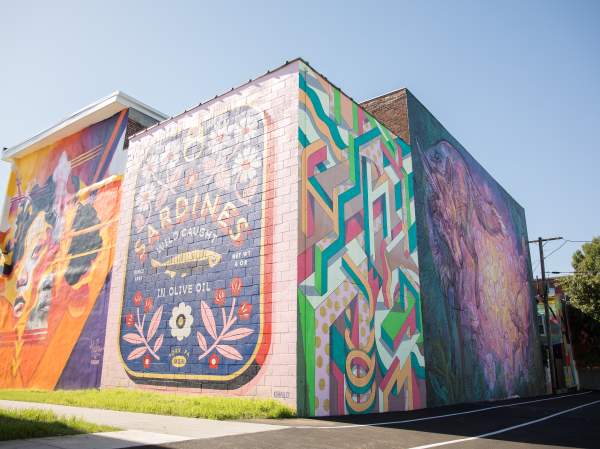 a few of the colorful murals at Mural Park in the Royal Square District