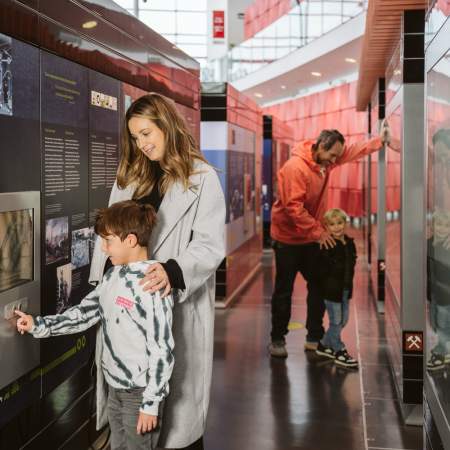 young family exploring the displays in the national waterfront museum
