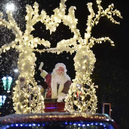 Father Christmas riding his sleigh in the Swansea Christmas Parade