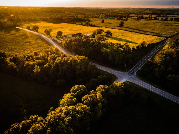 rural road with sun shining
