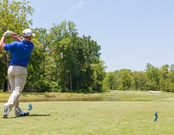 Man playing golf