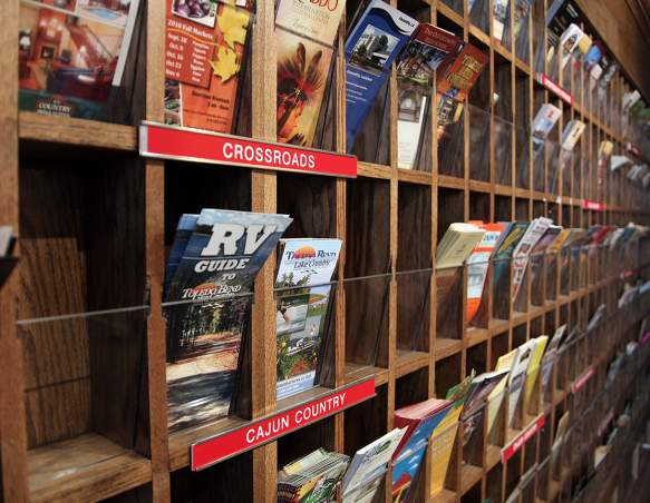Brochures in a rack at the Shreveport-Bossier Convention and Tourist Bureau Downtown Visitor Center
