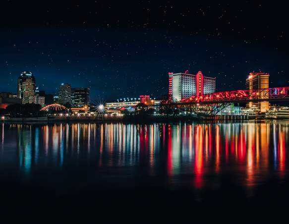 Shreveport night skyline reflected in Red River