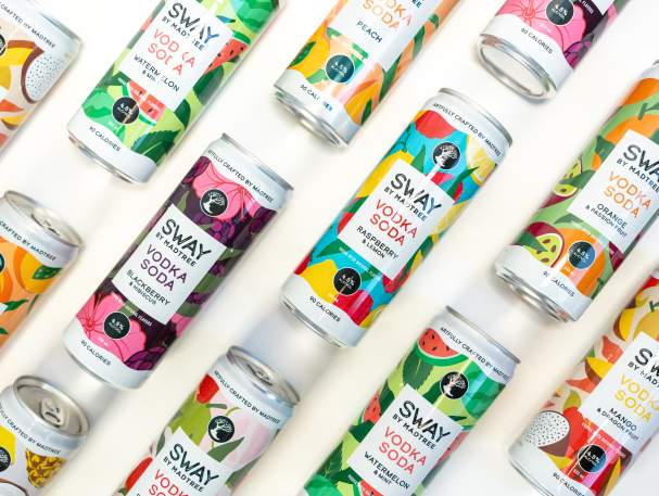 Brightly colored cans of Sway Vodka Soda lined up.