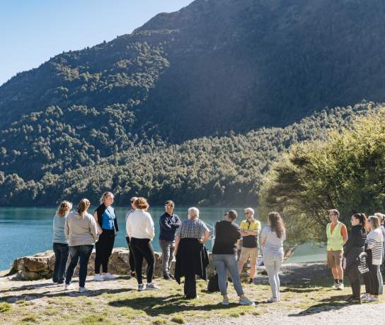 A group of people standing in front of Bob's Cove