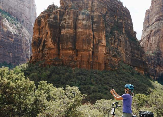 person riding e-bike at zions