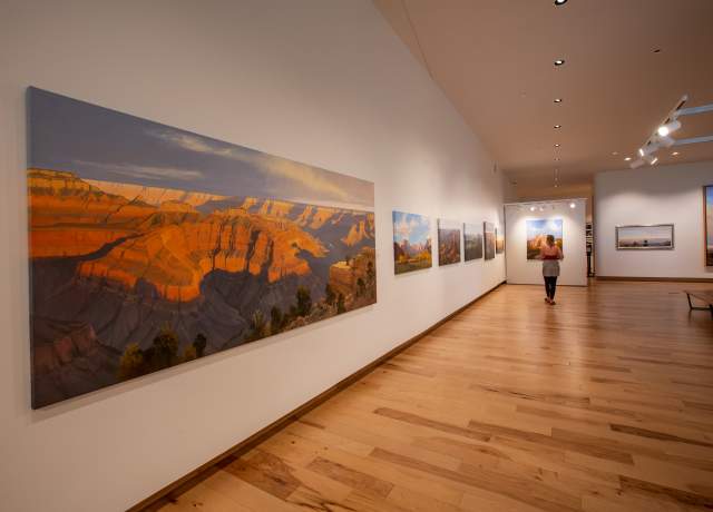 Exhibit at the Southern Utah Museum of Art in Cedar City showcasing the vibrant desert landscapes of Utah.
