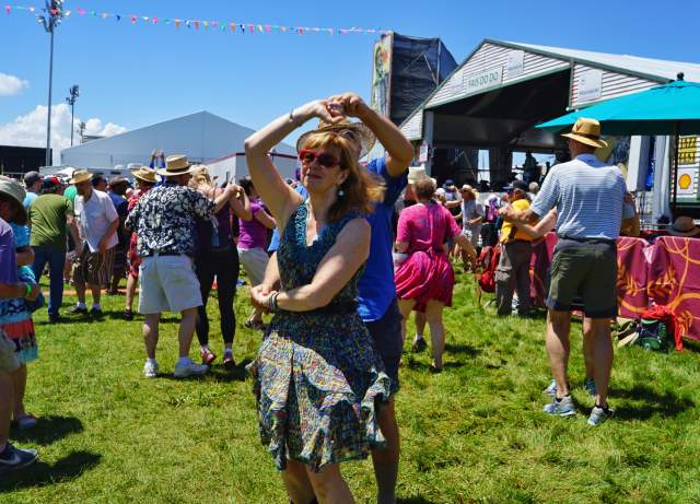 Dancing at the Fais Do Do Stage - Jazz Fest