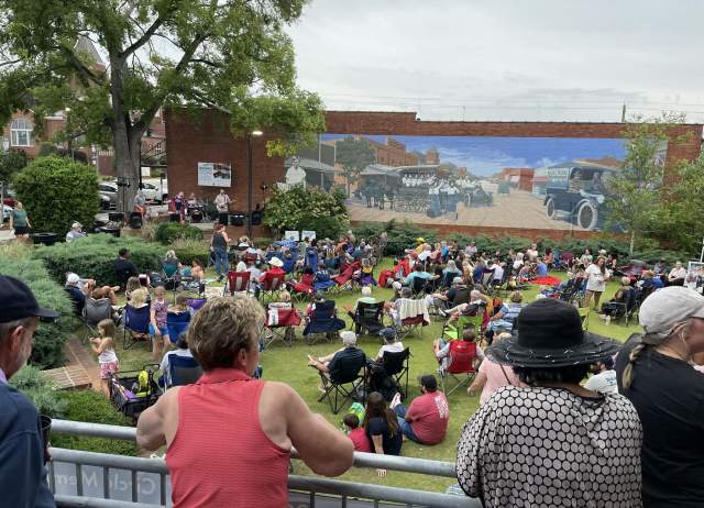 Visitors to Owl's Cove Park enjoy the summer concert series.