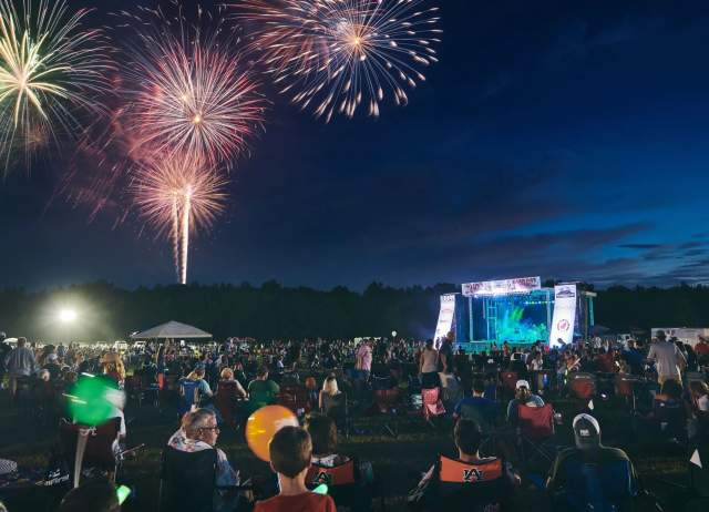 A full crowd of people enjoy a stunning fireworks display during Chelsea's Big Kaboom festival.