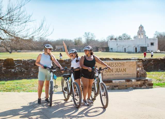 3 Friends with Bikes in front of Mission San Jose